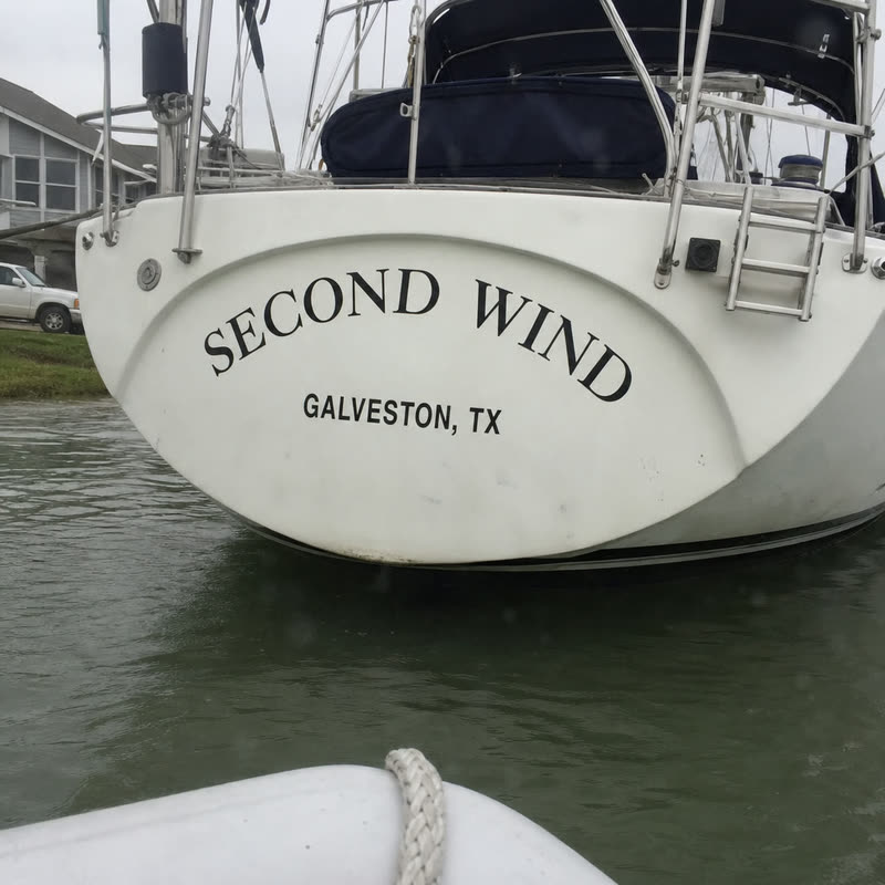 Name + hailing port · 6" and 4" on a curved transom. Arced to the curve from your photo.