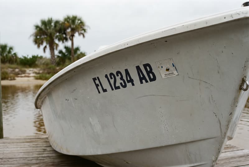 FL 1234 AB · 3" black on a light hull. What a Florida number looks like on the bow.