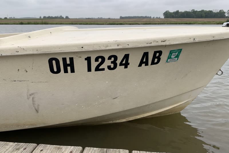 OH 1234 AB · 3" black on a light hull. What a Ohio number looks like on the bow.